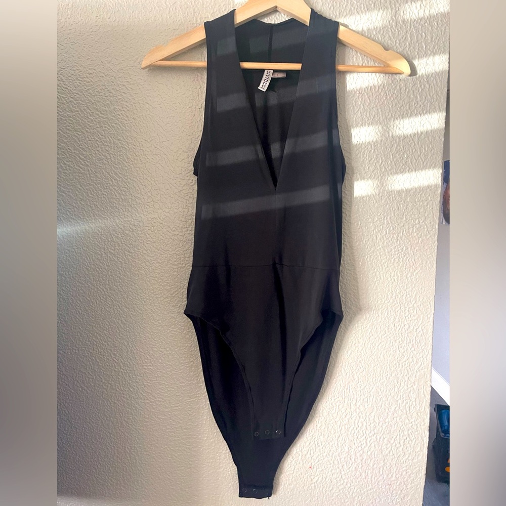 Divided body suit